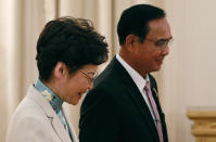 Hong Kong Chief Executive Carrie Lam, left, meets Thailand's Prime Minister Prayuth Chan-ocha at the government house in Bangkok, Thailand Friday, Nov. 29, 2019. (Jorge Silva/Pool Photo via AP)