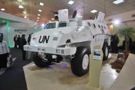 <b>Deftech AV4 Light Armoured Wheeled Vehicle</b> A product of DRB-Hicom, this armoured vehicle was designed and developed in Malaysia. The automatic-transmission behemoth trundles along at a stately top speed of 110 km/h.