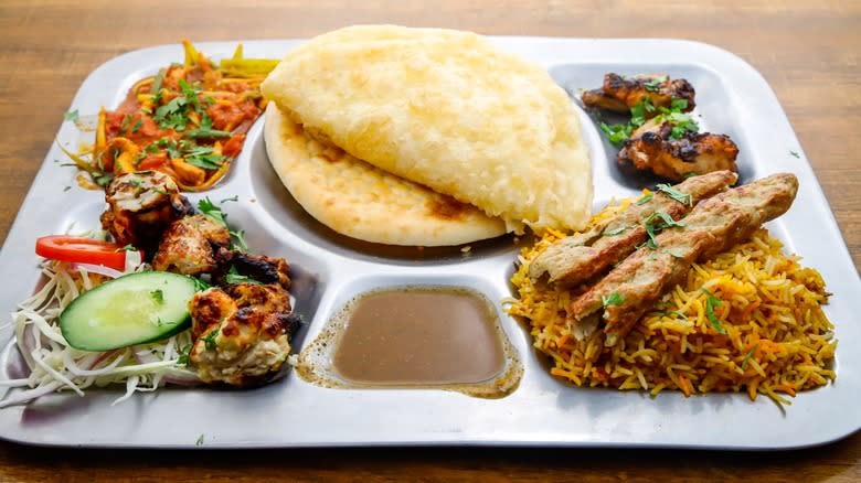 thali tray loaded with food