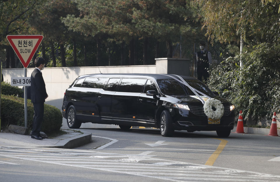 A hearse of the late Samsung Electronics chairman Lee Kun-Hee leaves outside a funeral hall in Seoul, South Korea, Wednesday, Oct. 28, 2020. Lee, who transformed the small television maker into a global giant of consumer electronics but whose leadership was also marred by corruption convictions, died on Sunday at the age of 78. (AP Photo/Lee Jin-man)