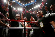 Boxing - WBA Welterweight Title Fight - Manny Pacquiao v Lucas Matthysse - Axiata Arena, Kuala Lumpur, Malaysia - July 15, 2018 Manny Pacquiao celebrates after defeating Lucas Matthysse REUTERS/Lai Seng Sin