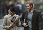 <p>The princess-to-be seemed surprised and delighted by the swarm of fans that gathered to get a glimpse of the royal couple in London on Tuesday. The newly engaged pair were headed to visit Reprezent 107.3FM in Brixton, which trains hundreds of young people every year in media and employment skills. (Photo: Mark Cuthbert/UK Press via Getty Images) </p>