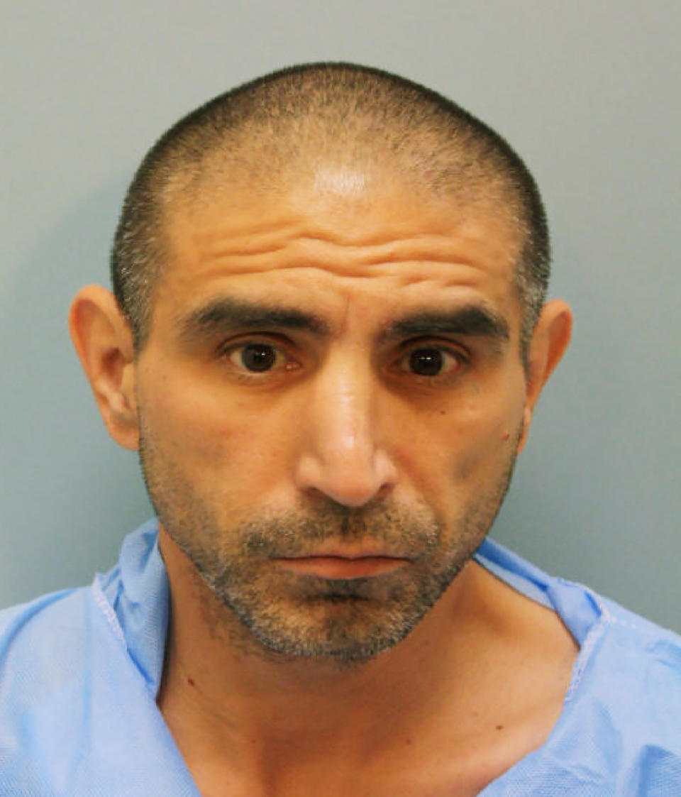 In this booking photo provided by Harris County Sheriff’s Office is Robert Solis. Solis, 47, of Houston has been charged with capital murder in the Friday, Sept. 27, 2019, shooting death of Harris County Sheriff's Deputy Sandeep Dhaliwal, 42, during a traffic stop near Houston. (Harris County Sheriff’s Office via AP)