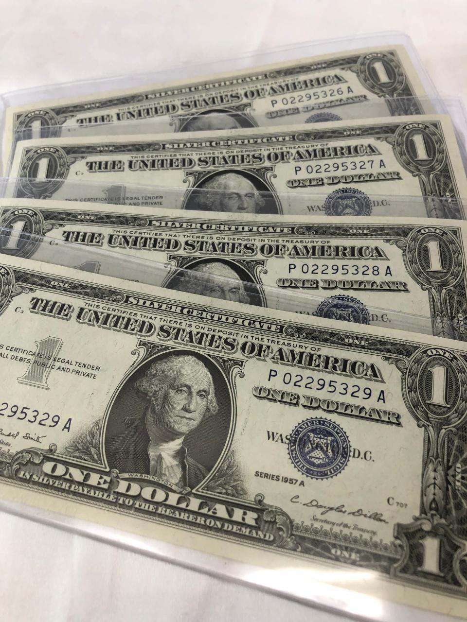 Sequential serial numbers like these four uncirculated silver certificates are catnip to collectors.