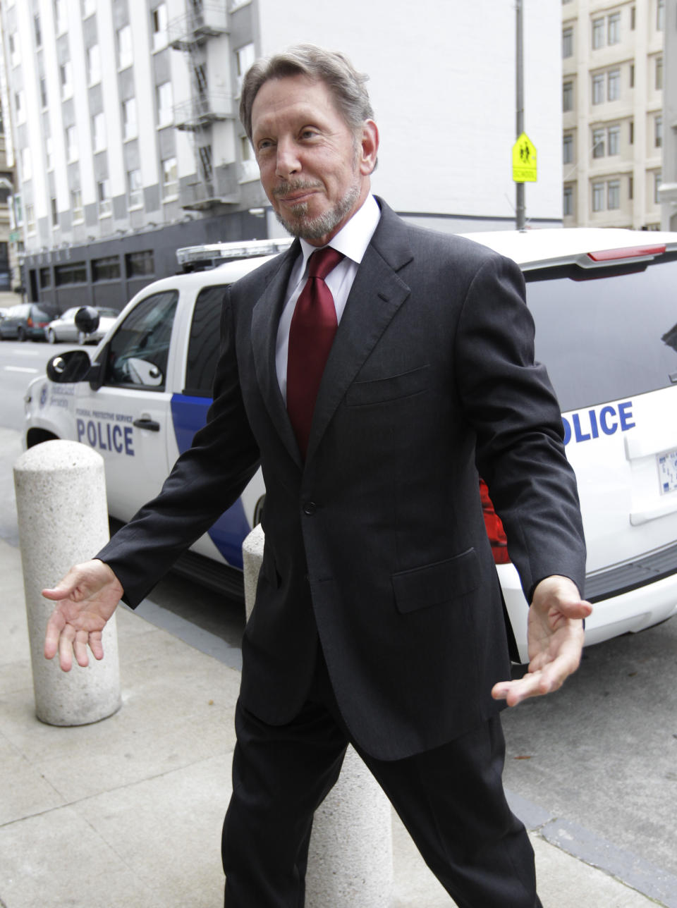 Oracle CEO Larry Ellison arrives for a court appearance at a federal building in San Francisco, Tuesday, April 17, 2012. Oracle intends to rely heavily on Google's own internal emails to prove Google's top executives knew they were stealing a popular piece of technology to build the Android software that now powers more than 300 million smartphones and tablet computers. (AP Photo/Paul Sakuma)