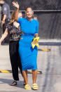 <p>Tracee Ellis Ross wears a bright blue dress with yellow accessories (and a face shield) as she heads to <em>Jimmy Kimmel Live </em>on Aug. 19 in L.A. </p>