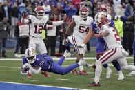 Kansas running back Devin Neal dives into the end zone to score a touchdown during the second half of an NCAA college football game against Oklahoma Saturday, Oct. 28, 2023, in Lawrence, Kan. Kansas won 38-33. (AP Photo/Charlie Riedel)