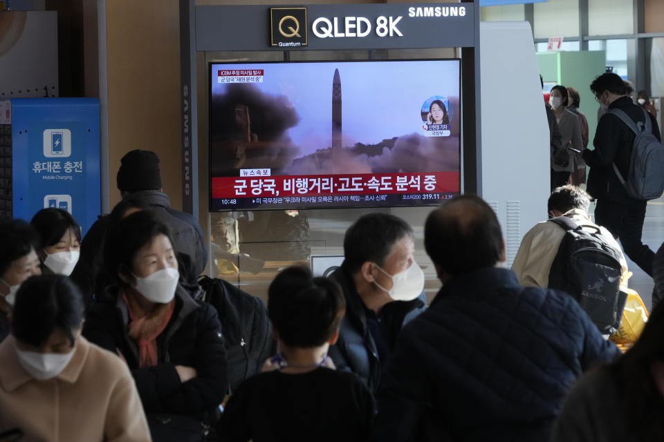 A TV screen shows a file image of North Korea's missile launch during a news program at the Seoul Railway Station in Seoul, South Korea, Friday, Nov. 18, 2022. South Korea says the missile North Korea launched Friday morning is likely an intercontinental ballistic missile. (AP Photo/Ahn Young-joon)