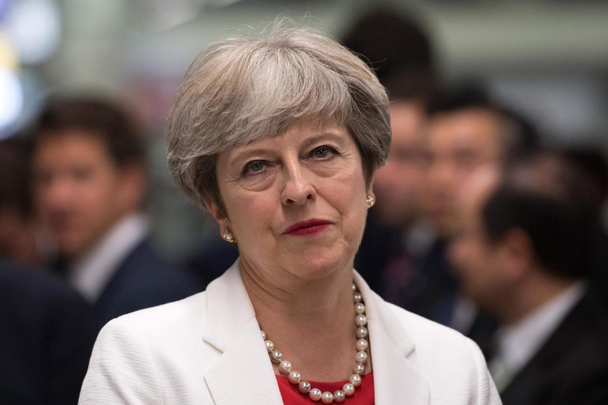 Theresa May will fly to Canada amid a leadership row involving Boris Johnson: Getty Images