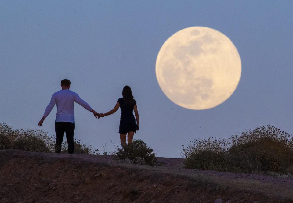 A Flower Moon rises over Fountain Hills, Arizona on May 6, 2020.