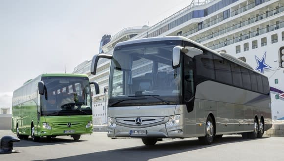 Two Mercedes-Benz buses.