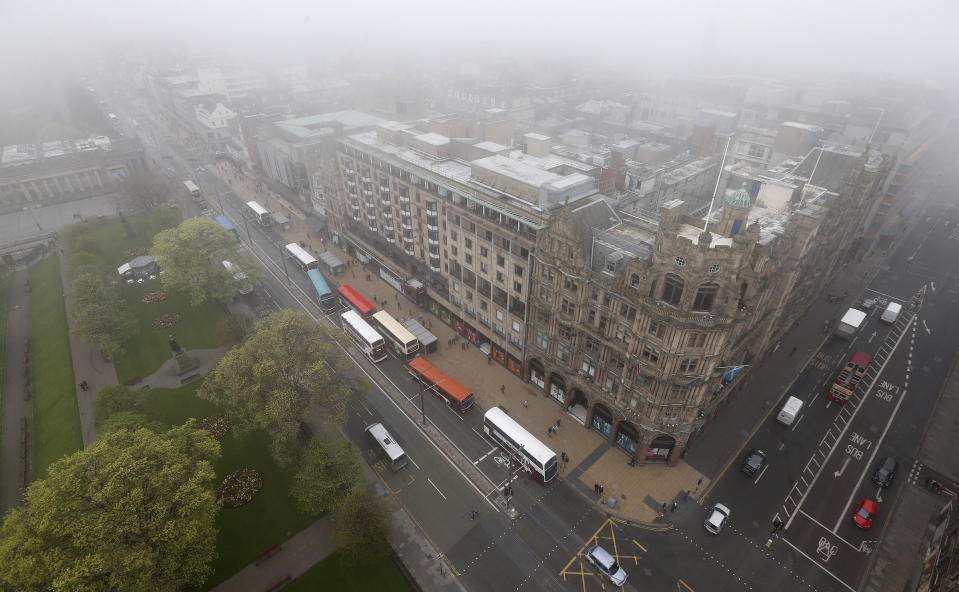 Traffic moves past Jenners department store in Edinburgh, Scotland April 30, 2014. REUTERS/Suzanne Plunkett (BRITAIN - Tags: POLITICS SOCIETY)