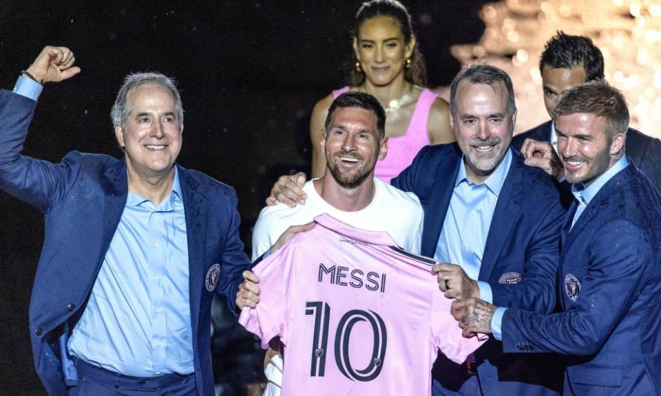 Miami’s owners, including David Beckham and Jorge Mas, celebrate the signing of Messi.