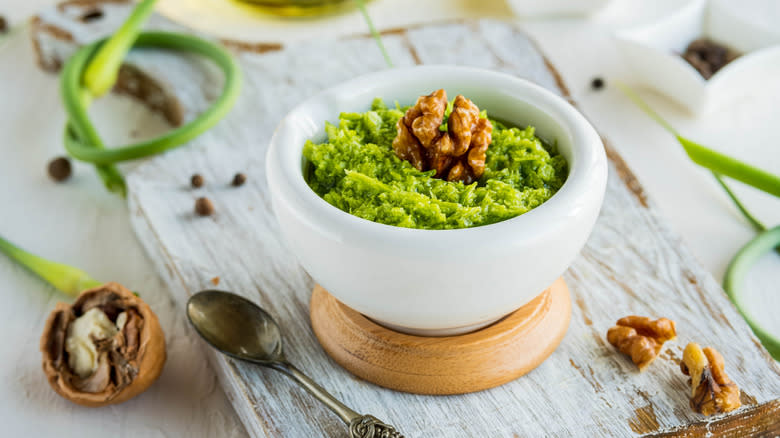 pesto with walnuts in bowl