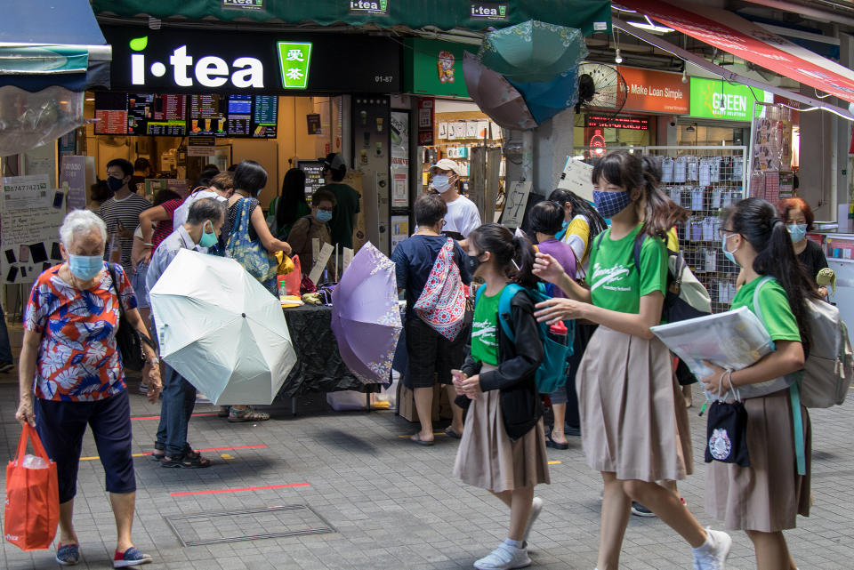 People seen at the Clementi Town Centre on 19 June 2020, the first day of Phase 2 of Singapore’s re-opening. (PHOTO: Dhany Osman / Yahoo News Singapore)