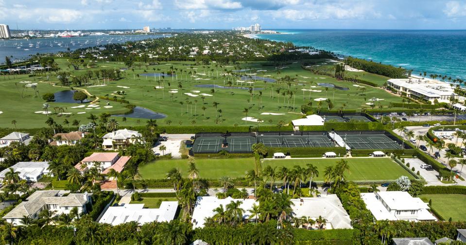 The house at 226 Fairview Road, foreground center, is on a street that borders the south side of the Palm Beach Country Club.