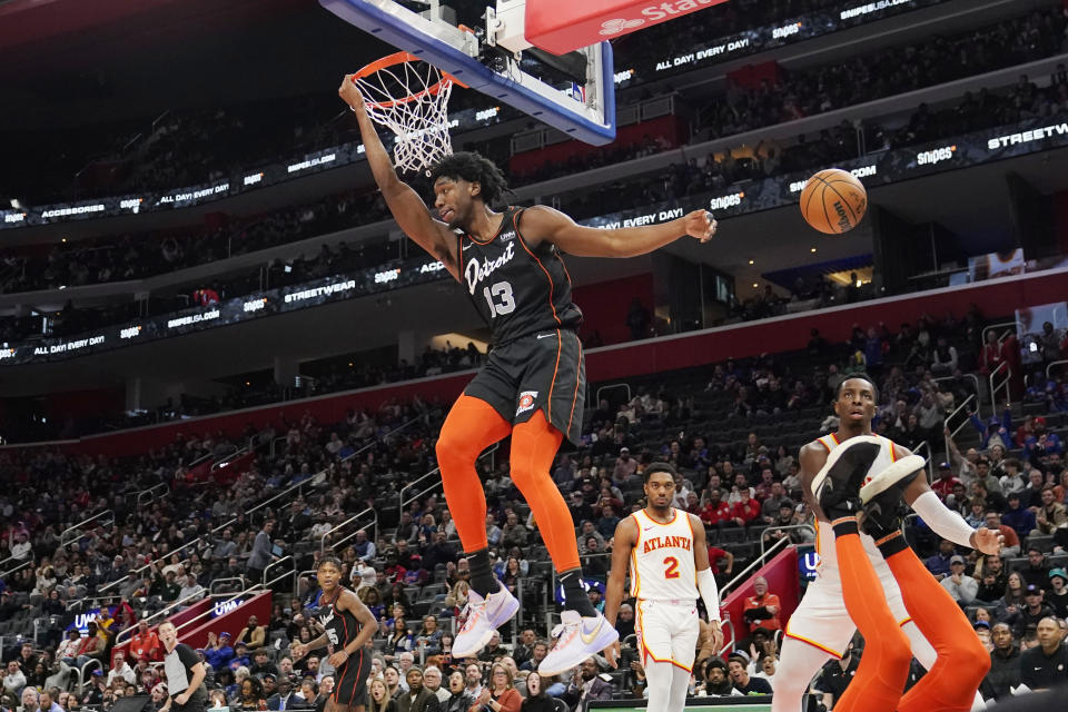 Detroit Pistons center James Wiseman dunks during the second half of an NBA basketball game against the Atlanta Hawks, Tuesday, Nov. 14, 2023, in Detroit. (AP Photo/Carlos Osorio)