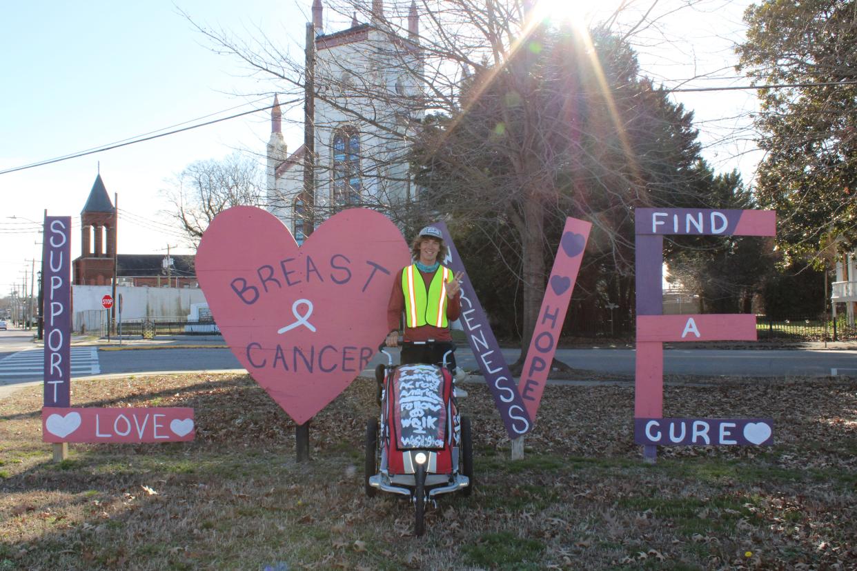 Holden Minor Ringer poses by a LOVE sign in Petersburg, Virginia on February 29, 2024.