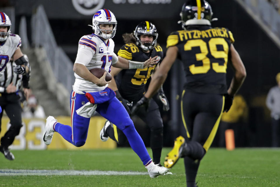 Buffalo Bills quarterback Josh Allen (17) runs the ball during the first half of an NFL football game against the Pittsburgh Steelers in Pittsburgh, Sunday, Dec. 15, 2019. (AP Photo/Don Wright)