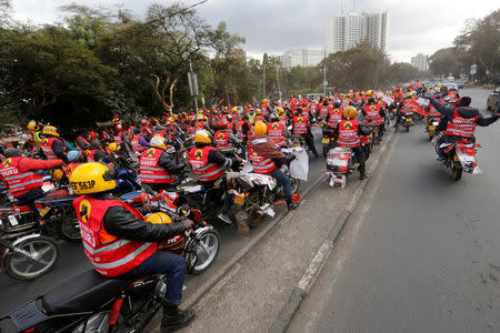 Supporters of Nairobi's Governor-elect Mike Sonko parade their motorbikes during a Jubilee Party campaign rally at Uhuru park in Nairobi, Kenya August 4, 2017. REUTERS/Thomas Mukoya