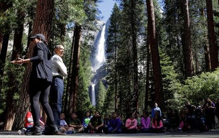 U.S. President Barack Obama and U.S. First Lady Michelle Obama take part in an "Every Kid in a Park" event with children at Yosemite National Park, California, U.S., June 18, 2016. REUTERS/Joshua Roberts