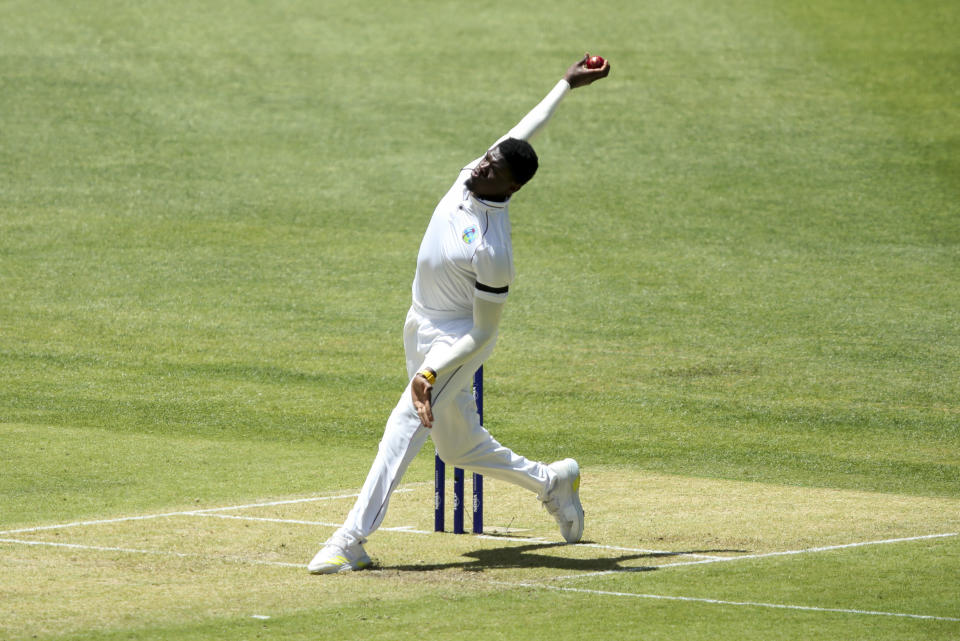 West Indies' Alzarri Joseph bowls during play on the first day of the first cricket test between Australia and the West Indies in Perth, Australia, Wednesday, Nov. 30, 2022. (AP Photo/Gary Day)