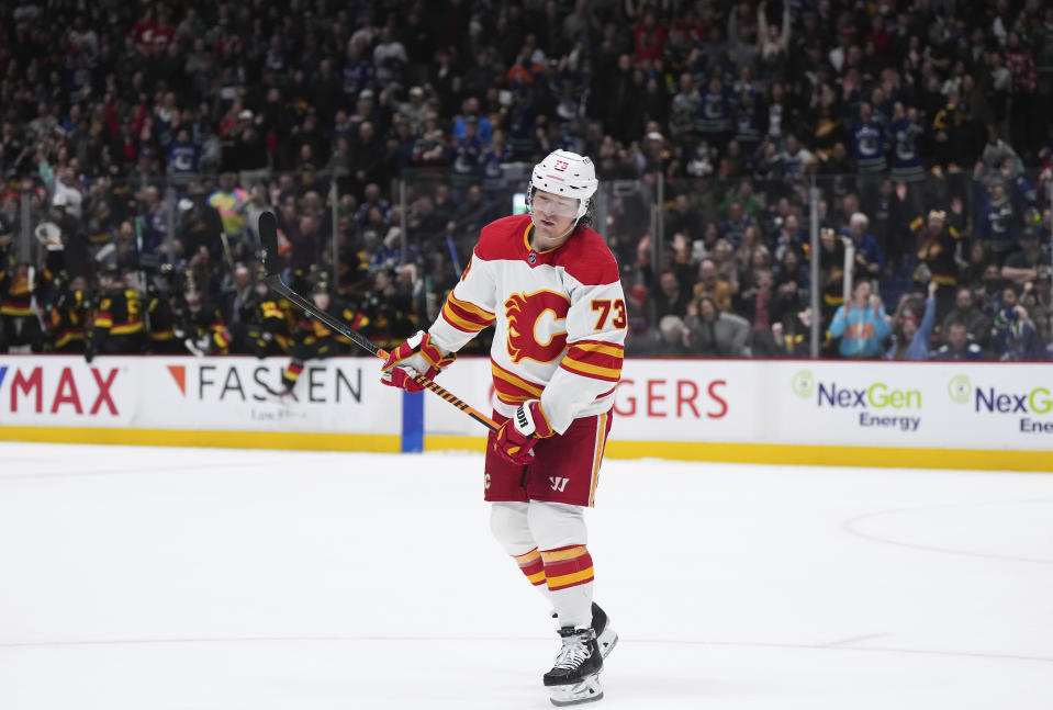 Calgary Flames' Tyler Toffoli pauses after failing to score against Vancouver Canucks goalie Thatcher Demko during the shootout in an NHL hockey game Saturday, April 8, 2023, in Vancouver, British Columbia. (Darryl Dyck/The Canadian Press via AP)