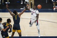 Gonzaga's Oumar Ballo (21) is fouled by West Virginia's Derek Culver (1) during the second half of an NCAA college basketball game Wednesday, Dec. 2, 2020, in Indianapolis. (AP Photo/Darron Cummings)