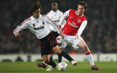 Andrea Pirlo of AC Milan is challenged by Aleksandr Hleb of Arsenal during the UEFA Champions League first knockout round, first leg match between Arsenal and AC Milan at the Emirates Stadium on February 20, 2008 in London, England - Credit: &nbsp;Getty Images&nbsp;