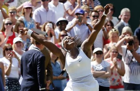 Serena Williams of the U.S.A celebrates after winning her Women's Final match against Garbine Muguruza of Spain at the Wimbledon Tennis Championships in London, July 11, 2015. REUTERS/Suzanne Plunkett