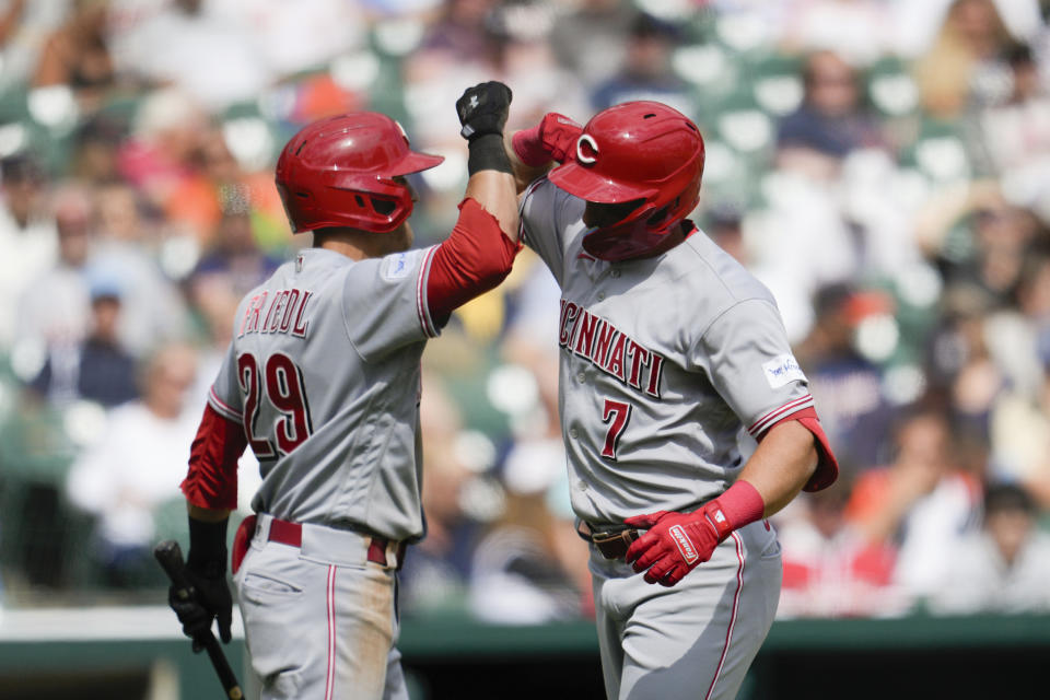 Cincinnati Reds' Spencer Steer (7) celebrates his home run with TJ Friedl (29) against the Detroit Tigers in the sixth inning of a baseball game, Thursday, Sept. 14, 2023, in Detroit. (AP Photo/Paul Sancya)