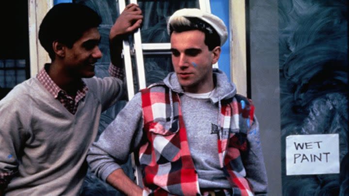 Omar and Johnny next to each other outside a store in My Beautiful Laundrette.