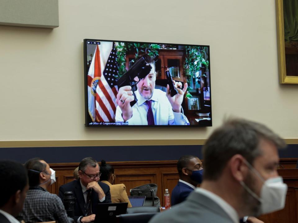 Rep. Greg Steube (R-FL) demonstrates assembling his handgun as he speaks remotely during a House Judiciary Committee mark up hearing in the Rayburn House Office Building on June 02, 2022 in Washington, DC (Getty Images)