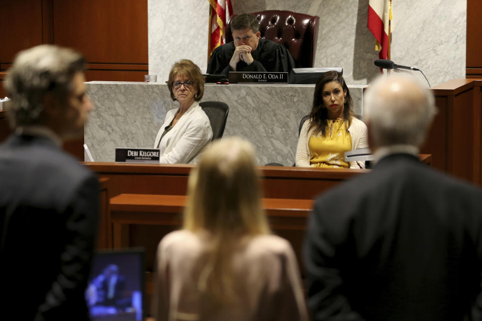 Warren County Common Pleas Judge Donald Oda II listens to a statement from Brooke Skylar Richardson during her sentencing hearing, Friday, Sept. 13, 2019, in Lebanon, Ohio. Richardson, acquitted the day before of killing her newborn but convicted of corpse abuse, was sentenced to three years' probation, was sentenced to three years' probation. (Kareem Elgazzar/The Cincinnati Enquirer via AP, Pool)