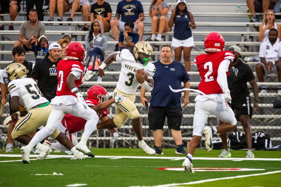 West Boca Raton's Javian Mallory (3) is tackled by Vero Beach's Affeon Rivers (34) in a high school spring football game Monday, May 13, 2024, at Vero Beach High School.