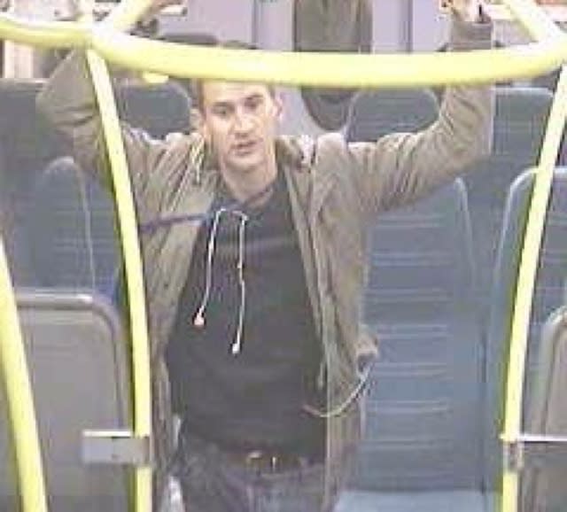 Search for man who 'senselessly attacked' London train passenger