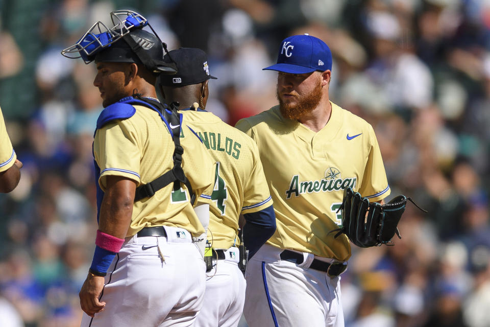 Kansas City Royals' Will Klein, right, is pulled during the second inning of the MLB All-Star Futures baseball game Saturday, July 8, 2023, in Seattle. (AP Photo/Caean Couto)