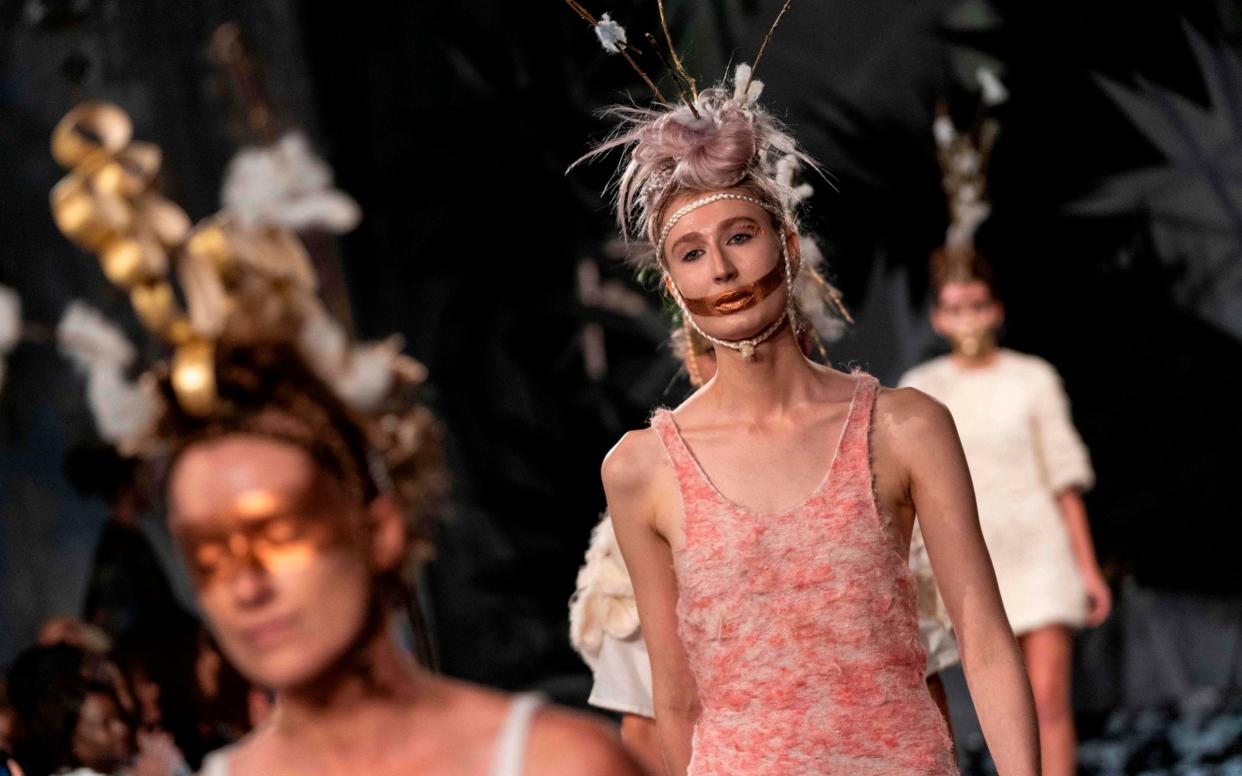 Models present work by Vin + Omi in their Spring/Summer 2020 collection on the final day of London Fashion Week - AFP