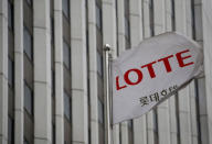 FILE PHOTO: A flag bearing the logo of Lotte Hotel flutters at a Lotte Hotel in Seoul, South Korea, March 25, 2016. REUTERS/Kim Hong-Ji/File Photo