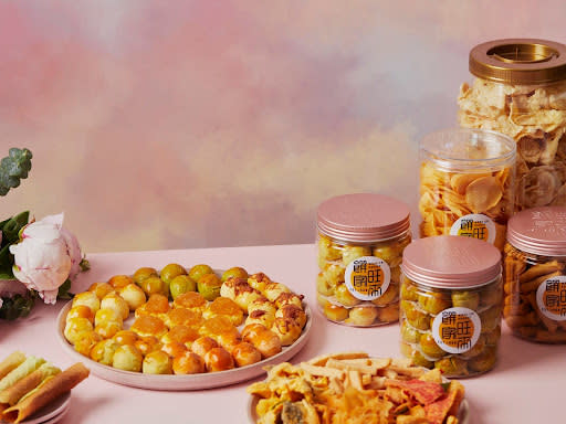 cny - containers of tarts and snacks