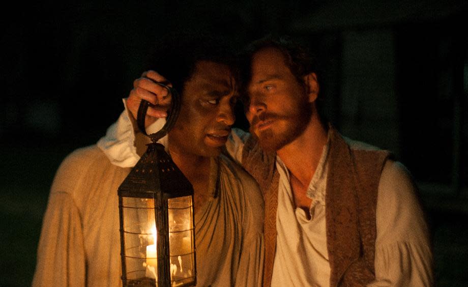 This image released by Fox Searchlight shows Chiwetel Ejofor, left, and Michael Fassbender in a scene from "12 Years A Slave." (AP Photo/Fox Searchlight, Francois Duhamel)