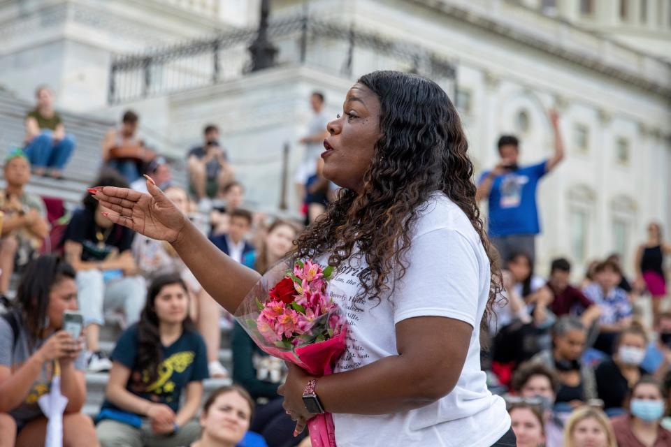 Rep. Cori Bush, D-Mo., addresses a sit-in on Capitol Hill on Aug. 3, 2021. The congresswoman, who lived in a car with her kids two decades ago after an eviction, slept and stayed outside the Capitol for several days protesting the lapse in the federal eviction moratorium.