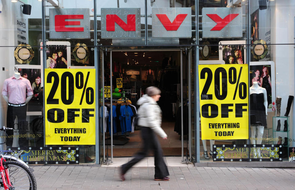 A general view of shops advertising sales in Leeds city centre.