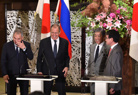 Russian Foreign Minister Sergei Lavrov and Defence Minister Sergei Shoigu attend their joint news conference with Japanese Foreign Minister Taro Kono and Defense Minister Takeshi Iwaya after their two-plus-two Foreign and Defense Ministers meeting between Japan and Russia at the Iikura Guest House in Tokyo, Japan, May 30, 2019. Kazuhiro Nogi/Pool via Reuters