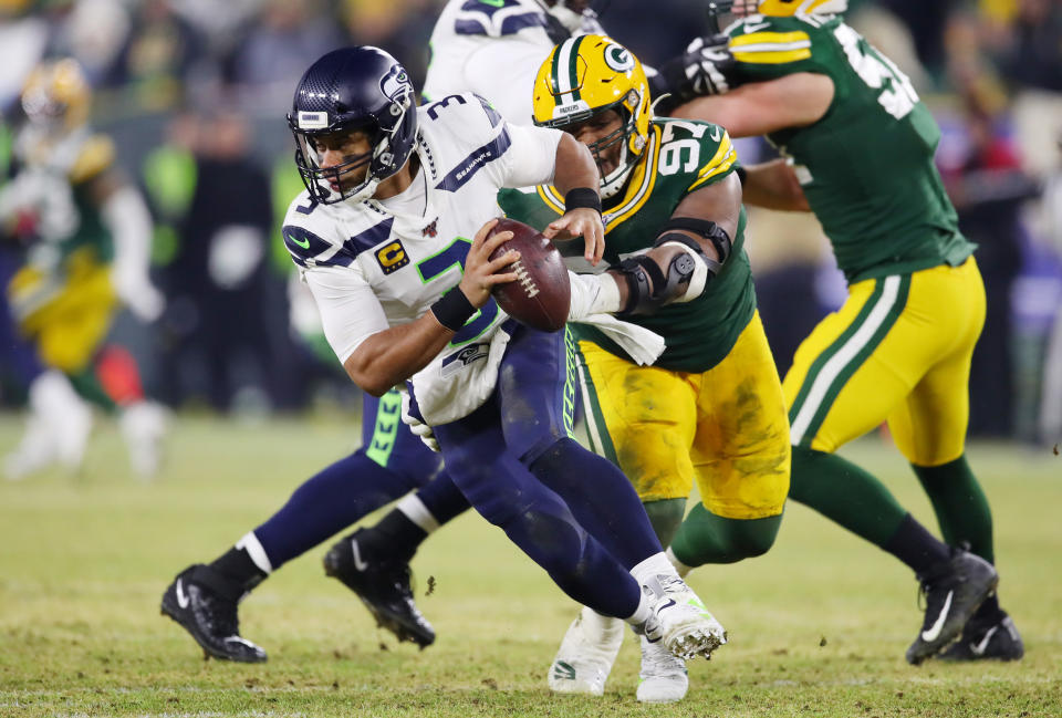 Russell Wilson played great in the second half but couldn't lead a comeback win. (Photo by Gregory Shamus/Getty Images)