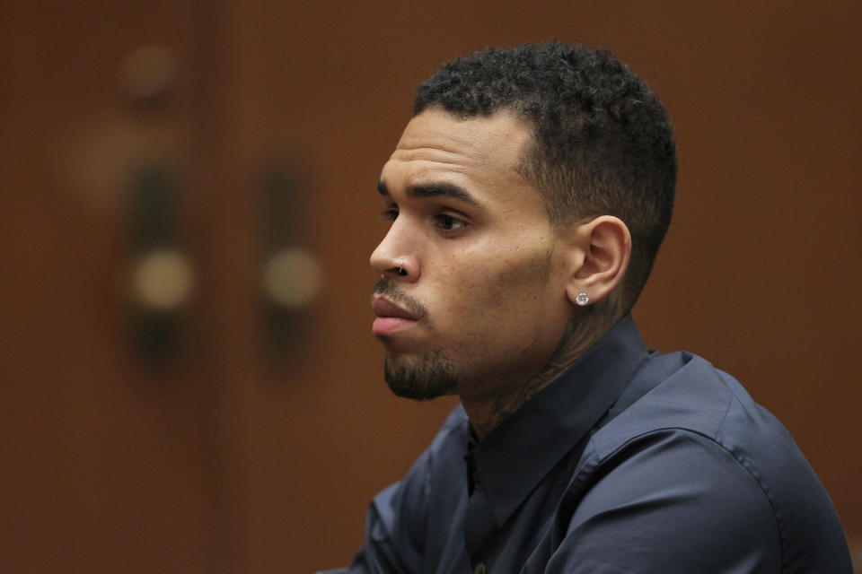 Chris Brown in court for a probation progress hearing in February 2014. (Photo: Getty Images)