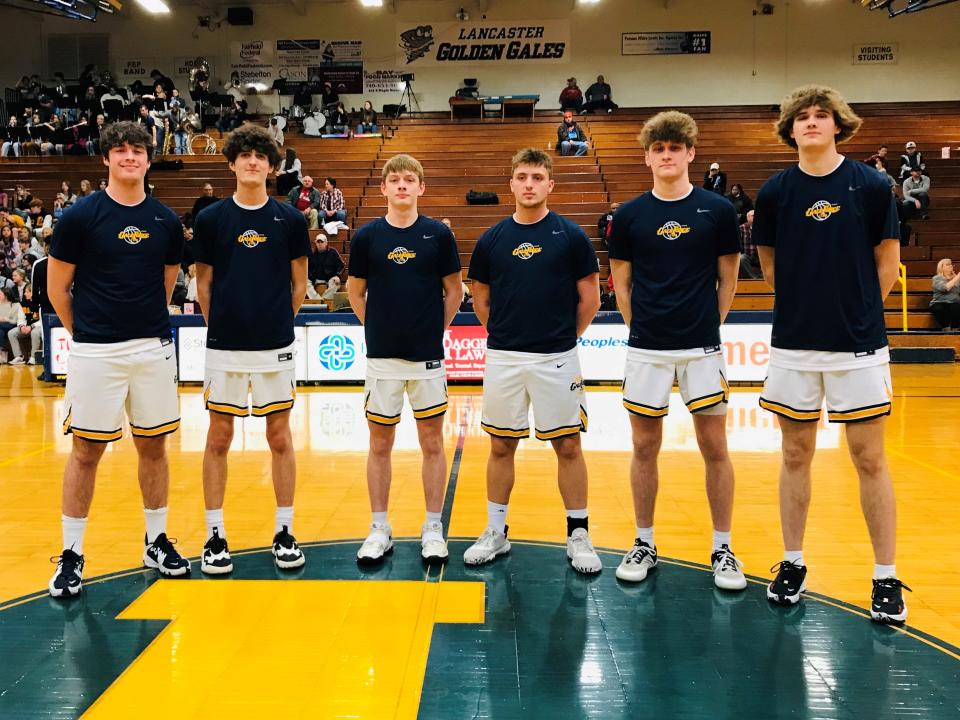 Lancaster's sis seniors were honored before Friday night's game against Groveport. From left to right: Sam Finck, Dominick Bornino, Dylan West, Carson Raoudabush, Kolton Pugh and Corbin Hietikko.