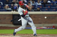 St. Louis Cardinals' Willson Contreras hits a home run against the New York Mets during the third inning of a baseball game Friday, April 26, 2024, in New York. (AP Photo/Frank Franklin II)