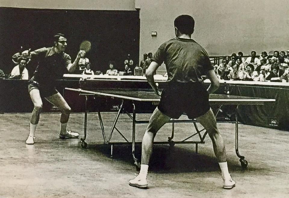 U.S. table tennis player Dell Sweeris, left, playing a friendship match in the U.S. with a Chinese player in 1972.