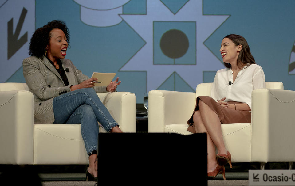 Rep. Alexandria Ocasio-Cortez, right, D-New York, speaks with Briahna Gray, a senior politics editor at The Intercept, during South by Southwest on Saturday, March 9, 2019, in Austin, Texas. Texas is an early primary state, but the real draw of the South by Southwest Festival in Austin for Democrats is face time with the party's ascendant young and liberal wing. The festival has grown from obscure roots into a weeklong juggernaut of tech, politics and entertainment. (Nick Wagner/Austin American-Statesman via AP)